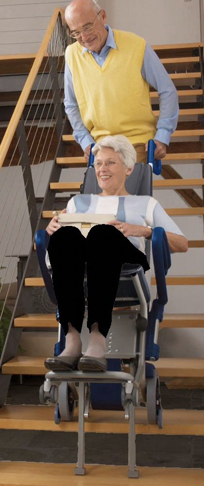 Elderly man uses a stairclimber to move his wife down stairs as we have trained him to ensure client safety