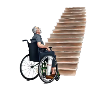 man with broken leg in a wheelchair looks at a flight of stairs wondering how he will get up them